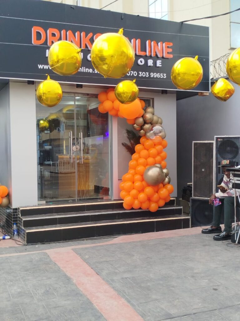 Entrance of Drinks Online Store decorated with balloons